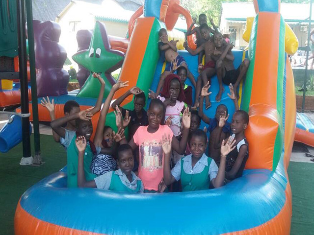 Children enjoying XMAS Party at Tamaindi Lodges <br> FUNDED BY C&C